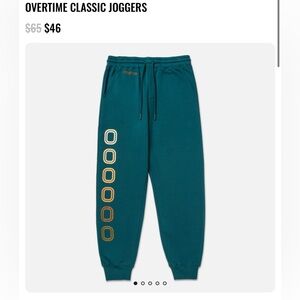 Champion Teal Sweatpants with yellow/ orange Details- new w/o tags